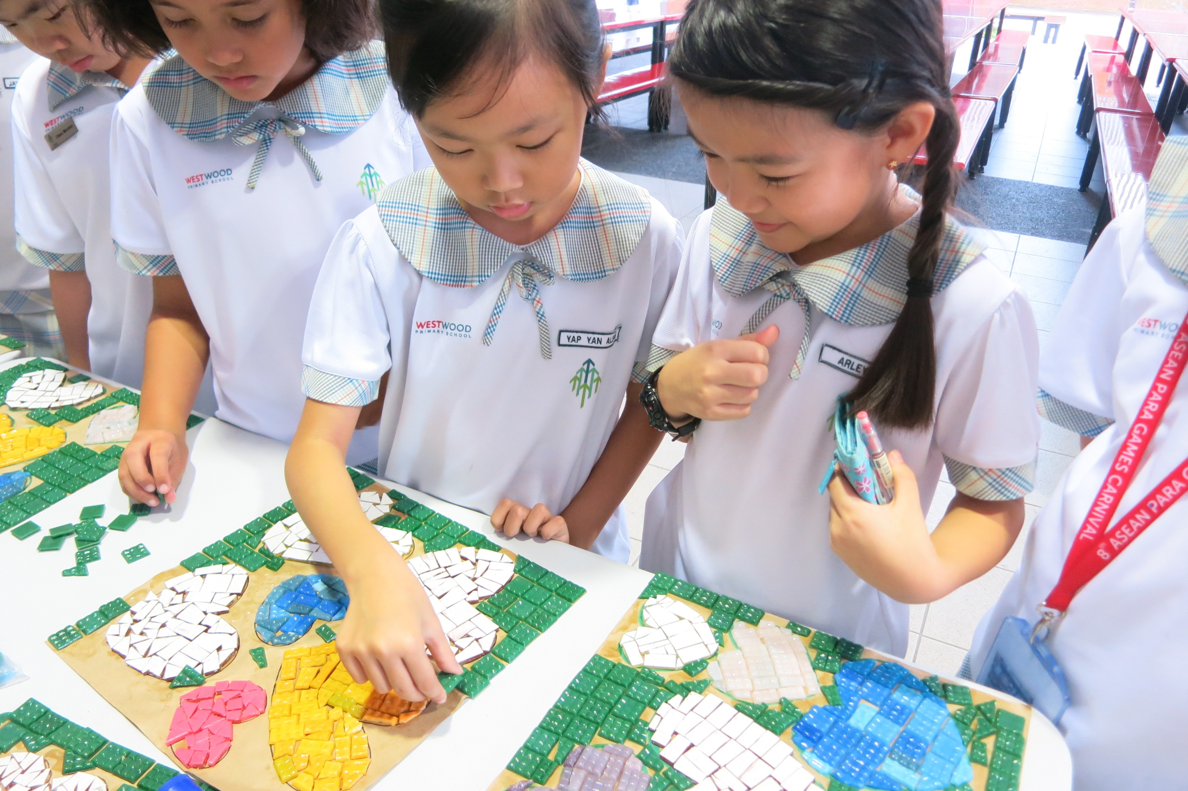 Children and mosaic artworks